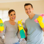 45858859 – portrait of young couple cleaning their new house