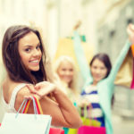 beautiful woman with shopping bags in the ctiy
