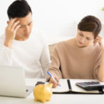 husband and wife with financial stress