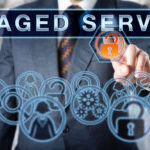 Corporate Manager Pushing MANAGED SERVICES
